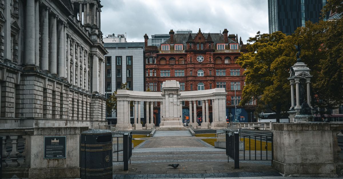 Historic architecture in Manchester with classical columns and red-bricked buildings.